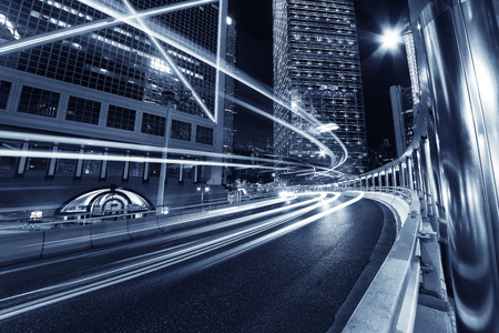 traffic in central district of Hong Kong city at nightの写真素材