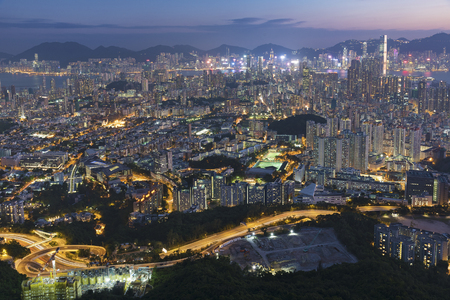 Panorama of aerial view of Hong Kong city at duskの写真素材