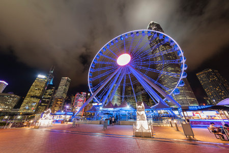 Ferris Wheel in Hong Kong City at nightのeditorial素材