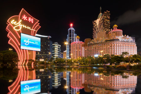 MACAU, CHINA - JUNE 30, 2016: Wynn Casino and Grand Casino Lisboa on June 30, 2016 in Macau. Macau is the world's top casino market and Casino Lisboa is one of the most well known casinos in the city.のeditorial素材