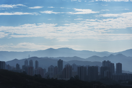 Silhouette city skyline and mountain. landscape of Hong Kong at dawnの写真素材
