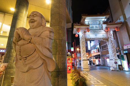 Kobe, Japan - April 12, 2016 : Buddha statue in Chinatown in Kobe, Japan.  Nankinmachi is a compact chinatown in central Kobe and a center of the Chinese community in the Kansai Regionのeditorial素材
