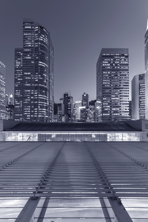 Modern office building and skyline of Hong Kong City at duskの写真素材