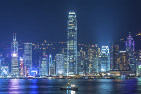 Victoria harbor of Hong Kong city at nightの写真素材