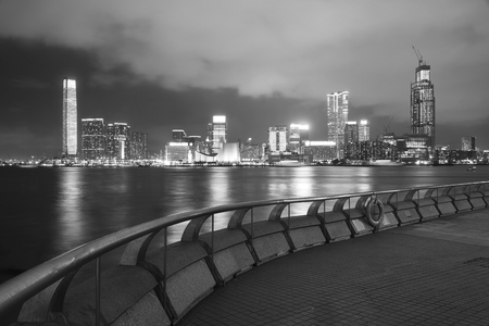 Skyline and harbor of Hong Kong city at nightの写真素材