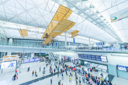 Hong Kong, China - April 04, 2016 : Arrival Hall in Hong Kong International Airport. It handles more than 70 million passengers per year.のeditorial素材