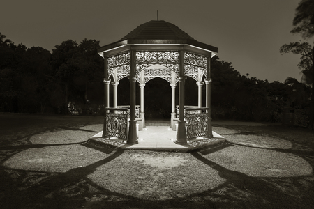 Gazebo in park at nightの写真素材