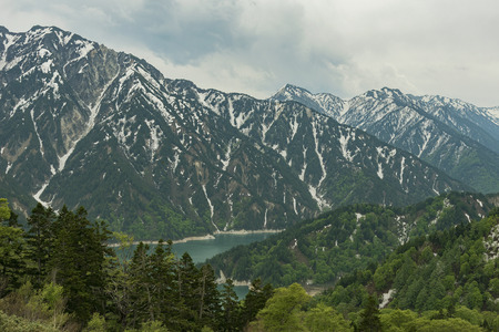 panorama view of snow mountain in Tateyama Kurobe Alpine Route, Japanの写真素材