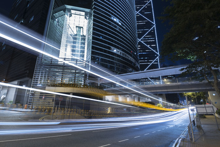 traffic in downtown of Hong Kong city at nightの写真素材