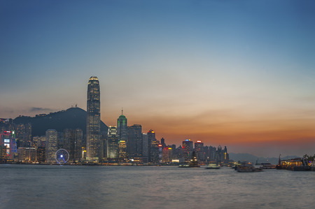 Victoria Harbor of Hong Kong city at duskの写真素材