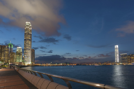 Skyline and harbor in Hong Kong city at dusk