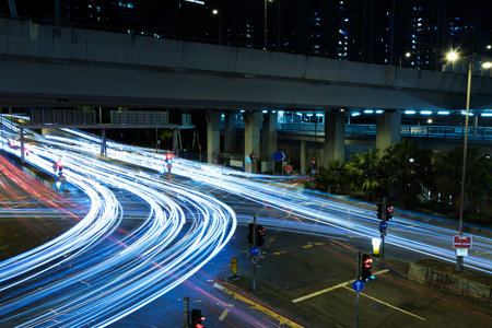 light trails of night traffic in the street in Hong Kong