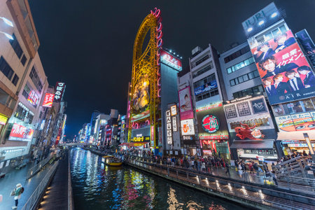 Osaka, Japan - April 13, 2016 : Canal and advertising billboard in Dontonbori, Namba area, Osaka, Japan. Namba is now primary tourist destination.のeditorial素材