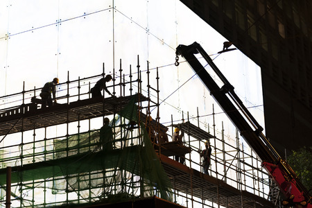 silhouette of construction worker at work