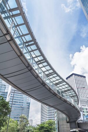 Modern foot bridge in downtown district of Hong Kong cityの写真素材