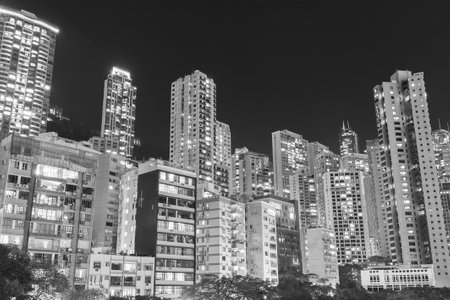 high rise residential building in Hong Kong city at nightのeditorial素材