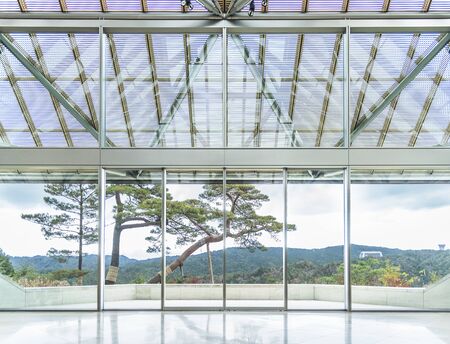 Lofty house with large window in countrysideの写真素材