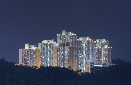 high rise residential building of public estate in Hong Kong city at night
