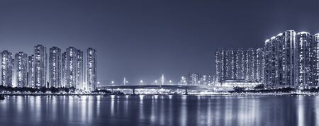Panorama of harbor and skyline of Hong Kong city at nightの写真素材