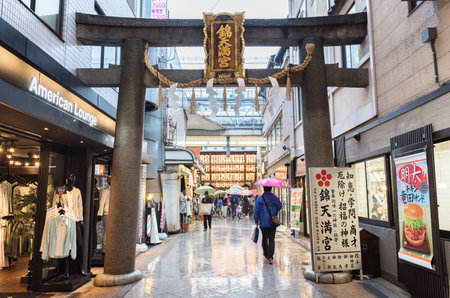 Kyoto, Japan - April 07, 2016 : Torii gate of Nishiki Tenmangu Shrine in Kyoto, Japan. The shrine is located in the heart of Nishiki food marketのeditorial素材