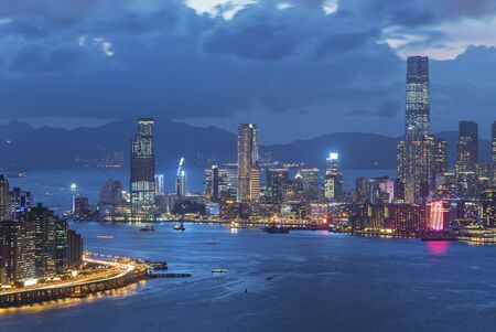 Victoria harbor of Hong Kong city at dusk