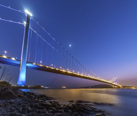 Tsing Ma bridge in Hong Kong at duskの写真素材