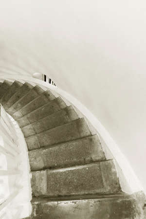 Interior view of old spiral staircase. Building abstract backgroundの写真素材