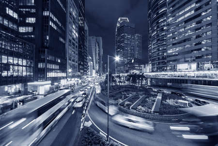 Traffic in downtown of Hong Kong city at nightの写真素材