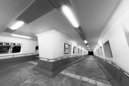 Night scene of empty modern pedestrian walkwayの写真素材