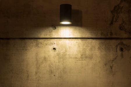 Grungy concrete wall and street light. Building abstract backgroundの写真素材