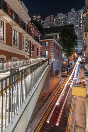 Traffic in old street of central district of Hong Kong city at night