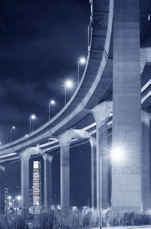 elevated highway and bridge in Hong Kong city at nightの写真素材