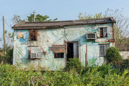 Abandoned residential house in rural area of Hong Kong cityの写真素材