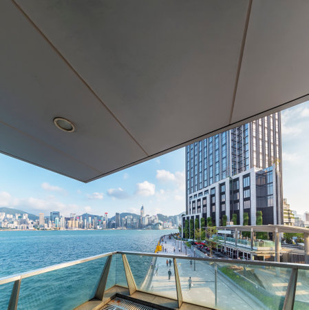 Seaside promenade of Victoria harbor of Hong Kong cityの写真素材