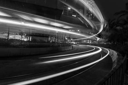 light trails of traffic in downtown of Hong Kong city at night. Traffic backgroundの写真素材
