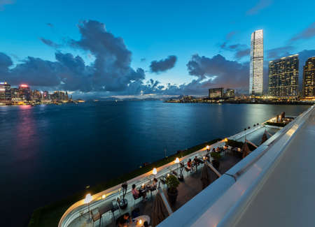Panorama of Victoria Harbor of Hong Kong city at dusk