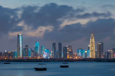 Skyline of Shenzhen city, China at night. Viewed from Hong Kong border Lau Fau Shanの写真素材