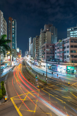 Hong Kong, China - May 01, 2021 : Busy traffic in downtown Yuen Long in Hong Kong, China. It is one of the district in Hong Kong with light rail as their main transportation.のeditorial素材