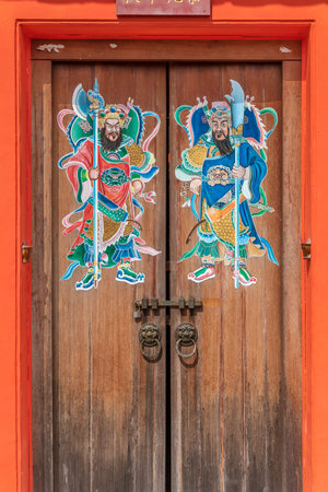 Door god painting of Chinese temple . Chinese people used to paste it on their housesâ front doors to pray for good luck and to prevent evil spirits from entering.のeditorial素材