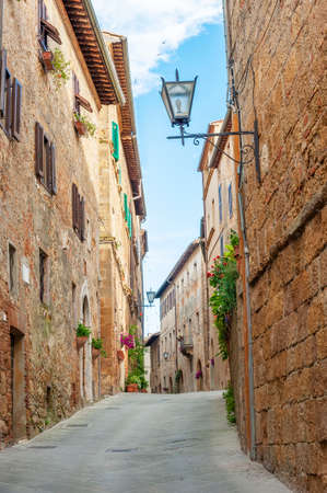 Alley in historical village Pienza in Tuscany, Italyの写真素材