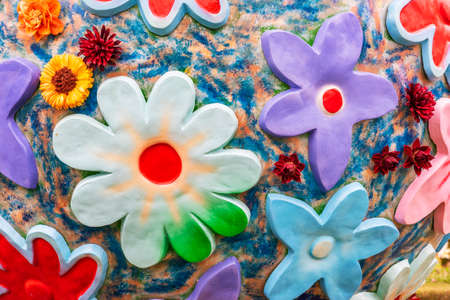 Plasticine hand made flower decoration. Abstract colorful natural background