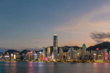 Scenery of panorama of Victoria harbor of Hong Kong city at duskの写真素材
