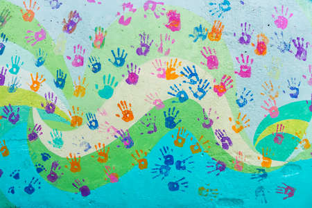 background made from color handprints of kids. Multicolor pattern for your design.の写真素材