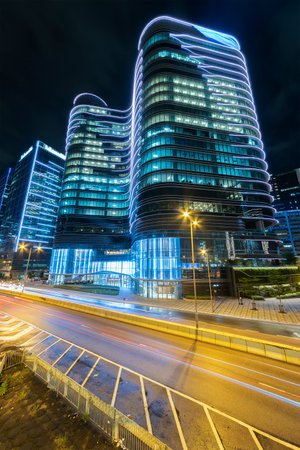 Modern building in downtown district of Hong Kong city at night