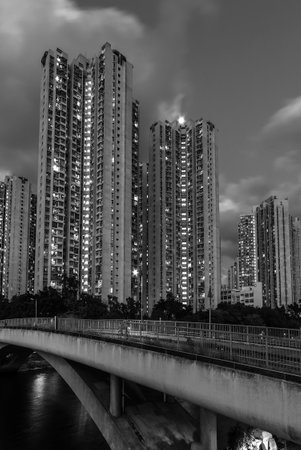 High rise residential building in Hong Kong city at duskの写真素材