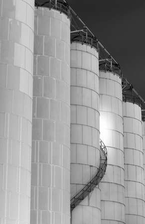 Spiral staircase on old storage tank. Industrial backgroundの写真素材