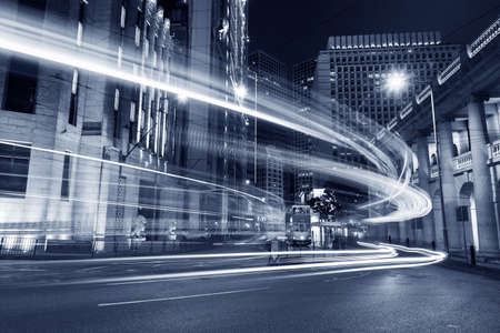 Traffic in downtown of Hong Kong city at nightの写真素材
