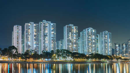high rise Residential building in Hong Kong city at nightの写真素材
