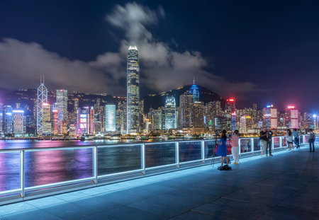 Skyline of Victoria harbor of Hong Kong city at nightのeditorial素材