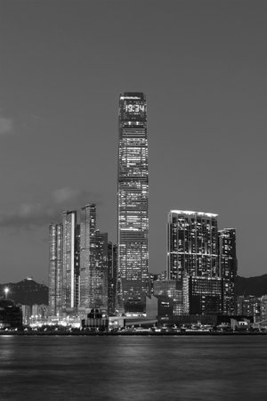 Scenery of skyscraper, skyline and harbor of Hong Kong city at dusk